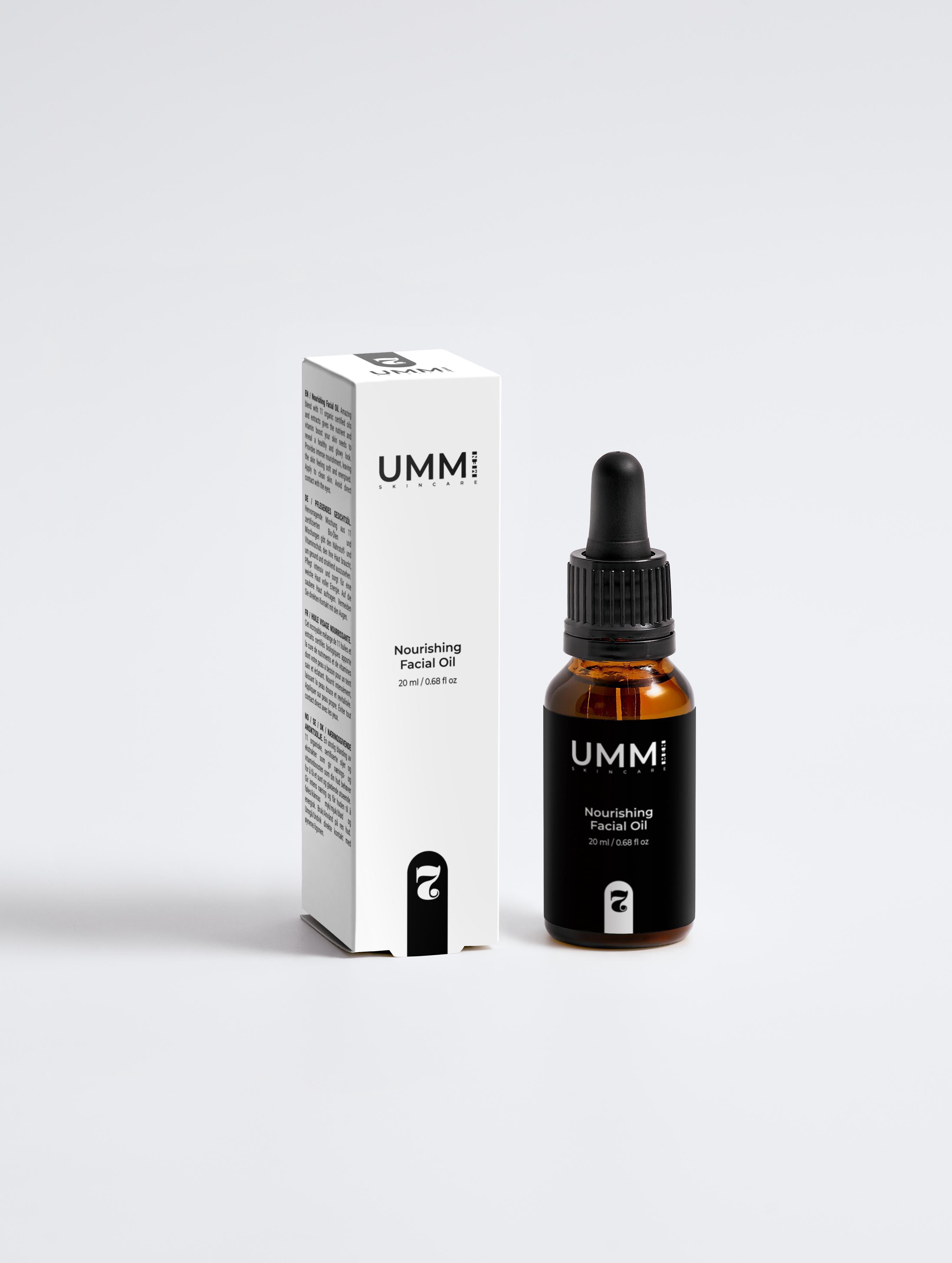 UMM! facial oil bottle and packaging on a white background